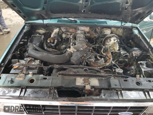 1987 Ford Bronco z VIN 1FMCU14T8HUA51662, wystawiony jako Copart lot #74972024 z przebiegiem 26 362 mil mil oraz Szkoda całkowita • Salvage title. Historia ofert i sprzedaży dostępna na DreamBid. Obrazek 12.