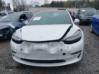 2018 Tesla Model 3 Long Range Battery z VIN 5YJ3E1EB8JF135728, wystawiony jako IAAI lot #41863870 z przebiegiem 124 053 mil mil oraz . Historia ofert i sprzedaży dostępna na DreamBid. Obrazek 12.