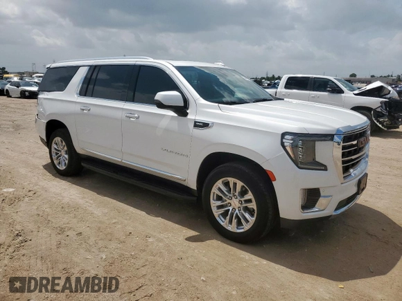 2021 GMC Yukon XL SLT with VIN 1GKS2GKD6MR429631, listed as a Copart auction lot 61150855 with 51,560 mi miles and Salvage title. Bid and sale history available at DreamBid. Image 4.