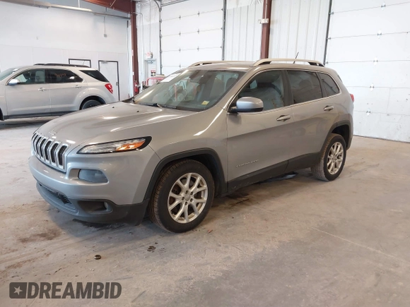 2014 Jeep Cherokee Latitude with VIN 1C4PJLCS1EW106004, listed as a IAAI auction lot 41786457 with 145,588 mi miles. Bid and sale history available at carsss.com. Image 17.