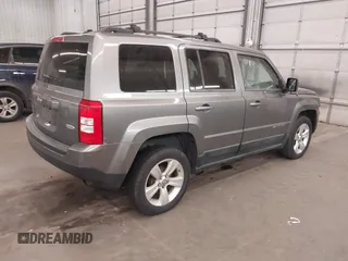 2011 Jeep Patriot Latitude with VIN 1J4NT1GB4BD288377, listed as a IAAI auction lot 41773432 with 194,021 mi miles and . Bid and sale history available at carsss.com. Image 4.