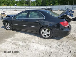 2005 Acura RL z VIN JH4KB16565C019863, wystawiony jako Copart lot #55317535 z przebiegiem 213 732 mil mil oraz Szkody całkowita. Historia ofert i sprzedaży dostępna na DreamBid. Obrazek 2.