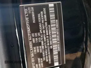 2023 McLaren GT z VIN SBM22GCA3PW002548, wystawiony jako Copart lot #52157855 z przebiegiem 779 mil mil oraz Szkody całkowita. Historia ofert i sprzedaży dostępna na DreamBid. Obrazek 2.