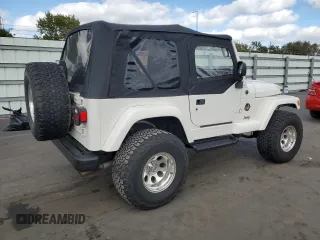 1999 Jeep Wrangler Sahara with VIN 1J4FY49SXXP414414, listed as a Copart auction lot 41643665 with 154,810 mi miles and Salvage Title. Bid and sale history available at carsss.com. Image 3.
