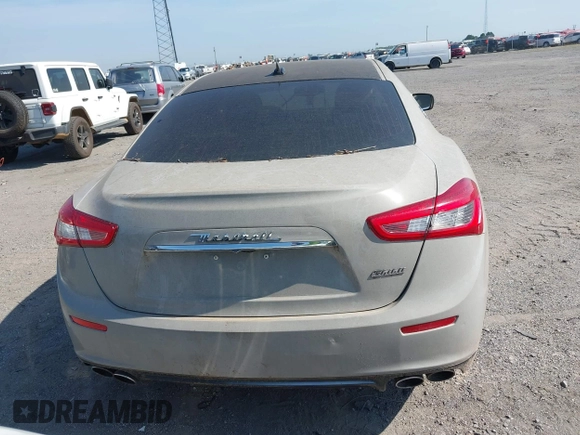 2015 Maserati Ghibli S Q4 with VIN ZAM57RTA7F1138207, listed as a IAAI auction lot 42573567 with Not provided miles and . Bid and sale history available at DreamBid. Image 16.