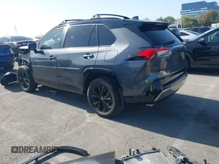2023 Toyota RAV4 Hybrid XSE with VIN 4T3E6RFV6PU120175, listed as a IAAI auction lot 42499631 with 27,452 mi miles and . Bid and sale history available at DreamBid. Image 3.