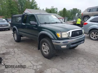 2002 Toyota Tacoma z VIN 5TEWM72N52Z077112, wystawiony jako IAAI lot #42466916 z przebiegiem 244 381 mil mil oraz . Historia ofert i sprzedaży dostępna na DreamBid. Obrazek 1.