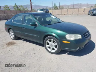 2000 Nissan Maxima GXE z VIN JN1CA31A8YT007617, wystawiony jako IAAI lot #42479039 z przebiegiem 165 950 mil mil oraz . Historia ofert i sprzedaży dostępna na DreamBid. Obrazek 1.