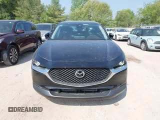 2021 Mazda CX-30 S with VIN 3MVDMBAL6MM264948, listed as a IAAI auction lot 42263077 with 13,614 mi miles and . Bid and sale history available at DreamBid. Image 12.