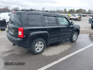 2014 Jeep Patriot Sport with VIN 1C4NJRBB4ED534026, listed as a IAAI auction lot 41850049 with 178,989 mi miles. Bid and sale history available at carsss.com. Image 4.