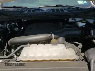 2023 Ford F-150 XL with VIN 1FTEW1C84PFC44902, listed as a Copart auction lot 65694425 with 23,120 mi miles and Salvage title. Bid and sale history available at DreamBid. Image 15.