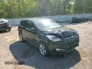 2016 Ford Escape SE with VIN 1FMCU9G93GUA77437, listed as a Copart auction lot 51807905 with 128,261 mi miles and Salvage Title. Bid and sale history available at DreamBid. Image 11.