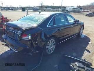 2015 Audi A8 L 4.0T with VIN WAU32AFD1FN021343, listed as a IAAI auction lot 41634469 with 88,229 mi miles. Bid and sale history available at carsss.com. Image 4.