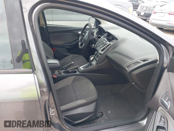 2014 Ford Focus SE with VIN 1FADP3F27EL139920, listed as a IAAI auction lot 42024617 with 143,223 mi miles and . Bid and sale history available at DreamBid. Image 5.