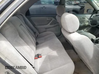 1999 Toyota Camry LE с VIN 4T1BG22K6XU404532, выставлен на аукционе Copart как лот 57449655 с пробегом 173 587 миль миль и Списание • Salvage title. История ставок и продаж доступна на DreamBid. Изображение 10.