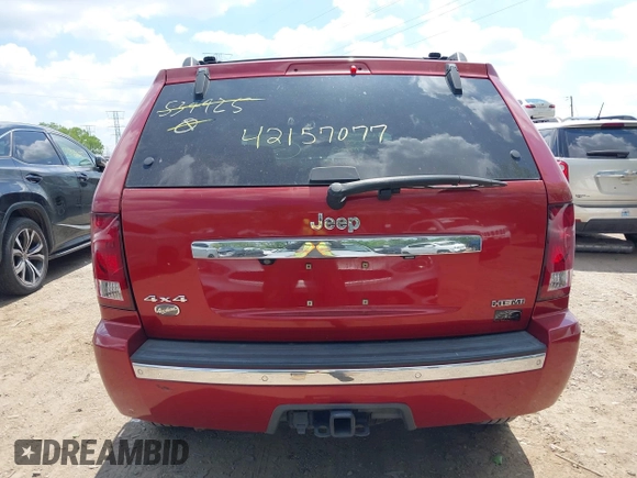 2009 Jeep Grand Cherokee with VIN 1J8HR68T79C539925, listed as a IAAI auction lot 42157077 with 140,443 mi miles and . Bid and sale history available at DreamBid. Image 15.