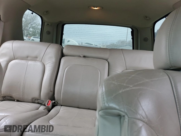 2002 Cadillac Escalade z VIN 1GYEK63N82R235118, wystawiony jako Copart lot #82691054 z przebiegiem 196 955 mil mil oraz Szkoda całkowita • Salvage title. Historia ofert i sprzedaży dostępna na DreamBid. Obrazek 10.