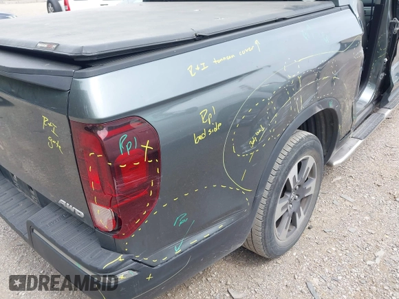 2018 Honda Ridgeline RTL-T with VIN 5FPYK3F61JB013733, listed as a IAAI auction lot 42548122 with 92,407 mi miles and . Bid and sale history available at DreamBid. Image 19.