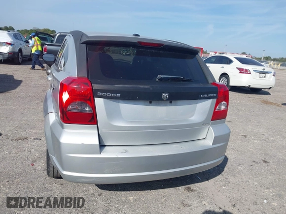 2009 Dodge Caliber SXT with VIN 1B3HB48A39D142674, listed as a IAAI auction lot 41642867 with 156,504 mi miles and . Bid and sale history available at carsss.com. Image 17.