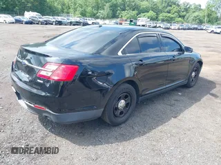 2014 Ford Police Interceptor with VIN 1FAHP2MK0EG170496, listed as a IAAI auction lot 42693683 with 147,921 mi miles and . Bid and sale history available at DreamBid. Image 4.