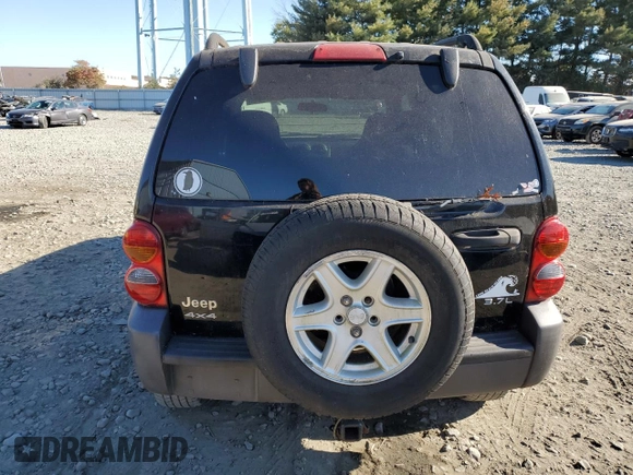 2003 Jeep Liberty Sport with VIN 1J4GL48K33W729978, listed as a Copart auction lot 76207834 with 104,992 mi miles and Clean Title. Bid and sale history available at carsss.com. Image 6.