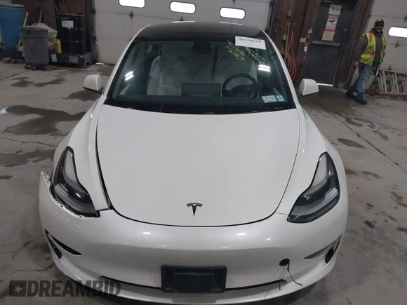 2021 Tesla Model 3 Long Range with VIN 5YJ3E1EBXMF051060, listed as a IAAI auction lot 41958018 with 65,631 mi miles. Bid and sale history available at carsss.com. Image 12.