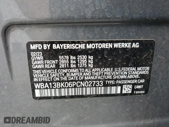 2023 BMW 5 Series M550i xDrive with VIN WBA13BK06PCN02733, listed as a Copart auction lot 48767235 with 27,725 mi miles and Salvage title. Bid and sale history available at DreamBid. Image 12.