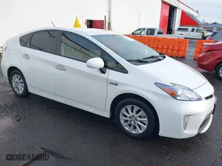 2013 Toyota Prius Plug-In with VIN JTDKN3DP6D3036749, listed as a IAAI auction lot 41206394 with 112,634 mi miles. Bid and sale history available at carsss.com. Image 1.