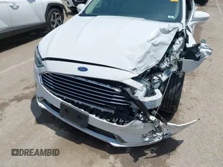 2020 Ford Fusion SEL with VIN 3FA6P0CD3LR152711, listed as a IAAI auction lot 42516763 with 97,073 mi miles and . Bid and sale history available at DreamBid. Image 17.