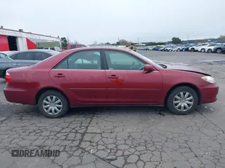 2006 Toyota Camry STD with VIN 4T1BE32K66U124135, listed as a IAAI auction lot 41776821 with 128,845 mi miles. Bid and sale history available at carsss.com. Image 13.