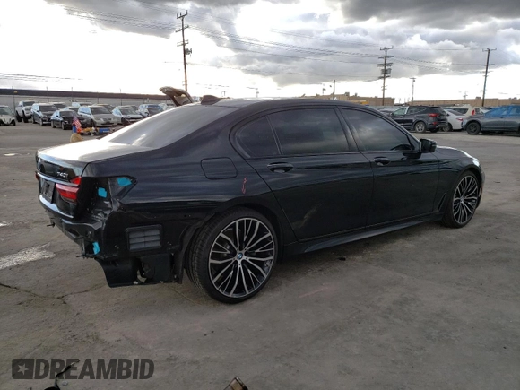 2019 BMW 7 Series 740i with VIN WBA7E2C55KB217499, listed as a Copart auction lot 43136573 with 36,419 mi miles. Bid and sale history available at carsss.com. Image 3.