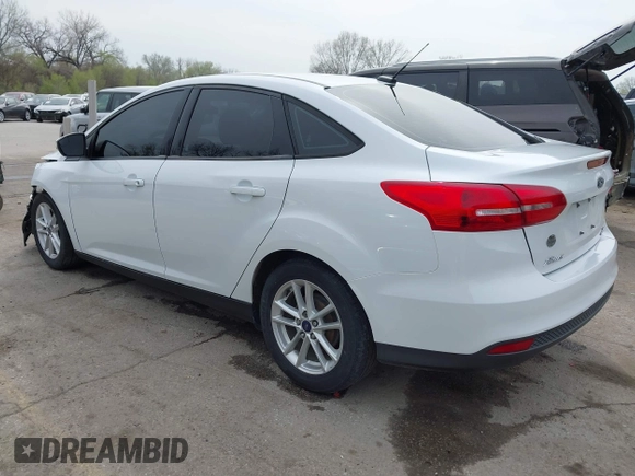 2016 Ford Focus SE with VIN 1FADP3F2XGL324613, listed as a IAAI auction lot 41971597 with 126,738 mi miles. Bid and sale history available at carsss.com. Image 3.