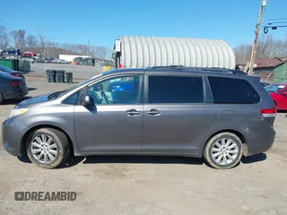 2013 Toyota Sienna XLE with VIN 5TDDK3DC6DS067612, listed as a IAAI auction lot 41756287 with 142,707 mi miles and . Bid and sale history available at DreamBid. Image 14.