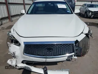 2014 Infiniti Q50 Premium with VIN JN1BV7ARXEM706864, listed as a IAAI auction lot 41787396 with 143,726 mi miles. Bid and sale history available at carsss.com. Image 13.