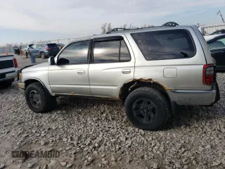 1999 Toyota 4Runner SR5 with VIN JT3HN86R2X0245132, listed as a Copart auction lot 77957964 with 241,861 mi miles and Clean title. Bid and sale history available at DreamBid. Image 2.
