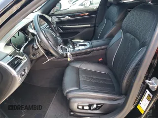 2019 BMW 7 Series 750i with VIN WBA7F0C57KGM25906, listed as a Copart auction lot 62728443 with 61,561 mi miles. Bid and sale history available at carsss.com. Image 7.