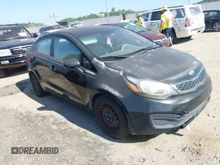 2013 Kia Rio EX with VIN KNADN4A36D6193449, listed as a IAAI auction lot 42750519 with 144,165 mi miles and . Bid and sale history available at DreamBid. Image 1.