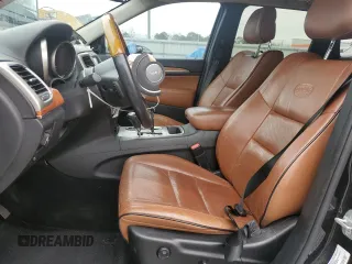 2013 Jeep Grand Cherokee Overland with VIN 1C4RJECG1DC546398, listed as a Copart auction lot 45834595 with 214,975 mi miles and Salvage Title. Bid and sale history available at carsss.com. Image 7.