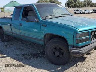 1995 GMC Sierra 1500 with VIN 1GTGC29N5SE541812, listed as a Copart auction lot 72408103 with 193,899 mi miles and Salvage Title. Bid and sale history available at DreamBid. Image 4.