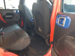 2023 Jeep Wrangler Sport with VIN 1C4HJXDG7PW676453, listed as a IAAI auction lot 42222995 with 32,347 mi miles and . Bid and sale history available at DreamBid. Image 8.