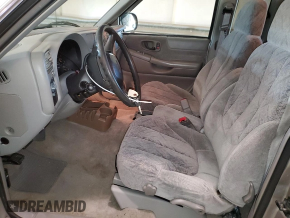 2000 GMC Sonoma SLS z VIN 1GTCS19W0Y8146125, wystawiony jako Copart lot #71576724 z przebiegiem 73 854 mil mil oraz Szkody całkowita. Historia ofert i sprzedaży dostępna na DreamBid. Obrazek 7.