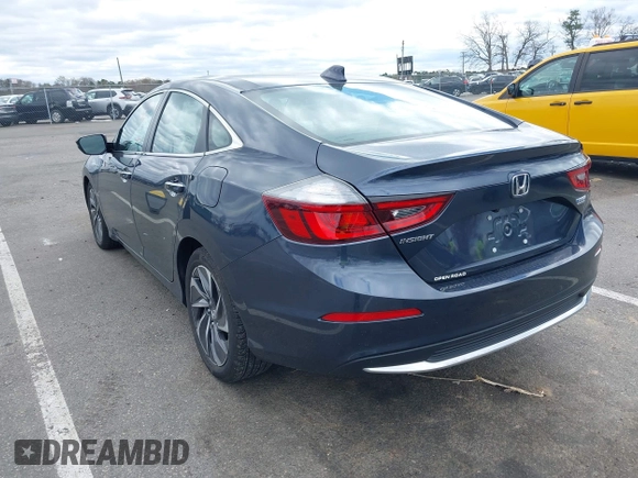 2022 Honda Insight Touring with VIN 19XZE4F90NE007552, listed as a IAAI auction lot 42038471 with 7,904 mi miles and . Bid and sale history available at carsss.com. Image 3.