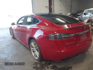 2016 Tesla Model S 90D with VIN 5YJSA1E24GF141543, listed as a IAAI auction lot 42045333 with Not Provided miles and . Bid and sale history available at DreamBid. Image 3.