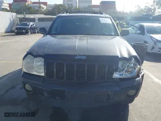 2005 Jeep Grand Cherokee Laredo with VIN 1J8GS48K95C615330, listed as a IAAI auction lot 41719101 with 152,186 mi miles. Bid and sale history available at carsss.com. Image 6.
