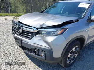 2019 Honda Ridgeline RTL with VIN 5FPYK3F54KB018272, listed as a IAAI auction lot 42184895 with 75,362 mi miles and . Bid and sale history available at DreamBid. Image 6.
