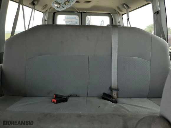 2014 Ford Econoline Wagon XL with VIN 1FBNE3BL4EDA25746, listed as a Copart auction lot 69606994 with 107,842 mi miles and Salvage Title. Bid and sale history available at carsss.com. Image 10.