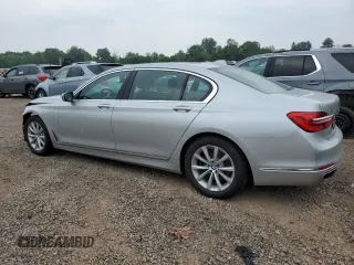 2018 BMW 7 Series 740i xDrive with VIN WBA7E4C56JGV23835, listed as a Copart auction lot 55254573 with 103,713 mi miles. Bid and sale history available at carsss.com. Image 2.