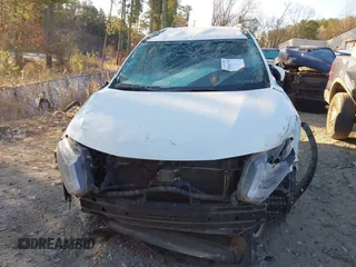 2018 Nissan Rogue S with VIN KNMAT2MT1JP597051, listed as a IAAI auction lot 41814178 with 181,563 mi miles and . Bid and sale history available at carsss.com. Image 12.