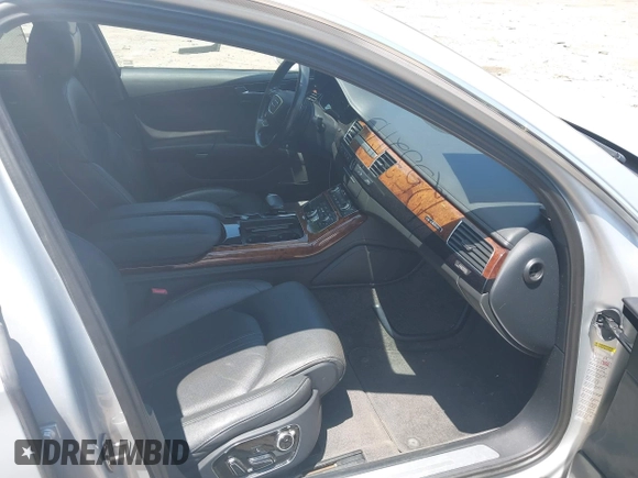 2011 Audi A8 with VIN WAURVAFD4BN019033, listed as a IAAI auction lot 42532173 with 97,486 mi miles and . Bid and sale history available at DreamBid. Image 5.