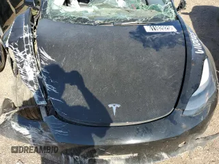 2023 Tesla Model 3 z VIN 5YJ3E1EA2PF460035, wystawiony jako Copart lot #61102025 z przebiegiem Nie podano mil oraz Szkoda całkowita • Salvage title. Historia ofert i sprzedaży dostępna na DreamBid. Obrazek 11.